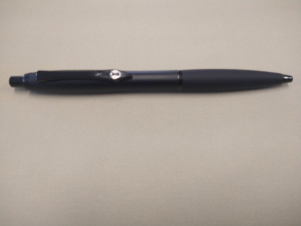 Matte black Platignum No. 9 ballpoint pen with soft grip and metal clip.