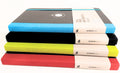 Flex Global notebooks with red, light green, black and turquoise bindings, made in Greece