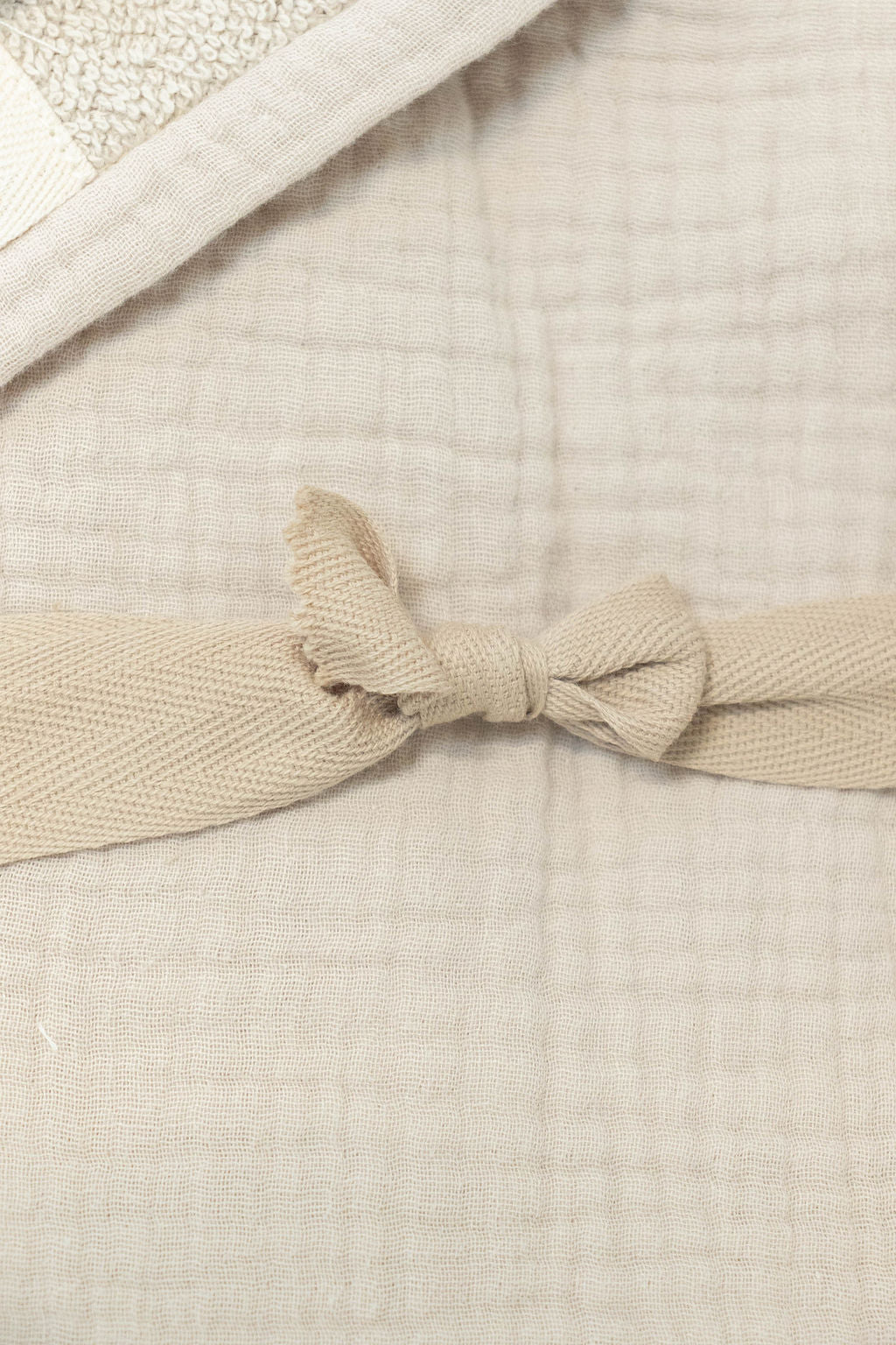 Petite Evelina Light Beige hooded baby towel showing cotton terry and muslin layers