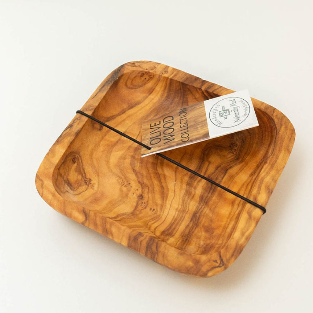 Handcrafted square olive wood dipping dish with natural wood grain