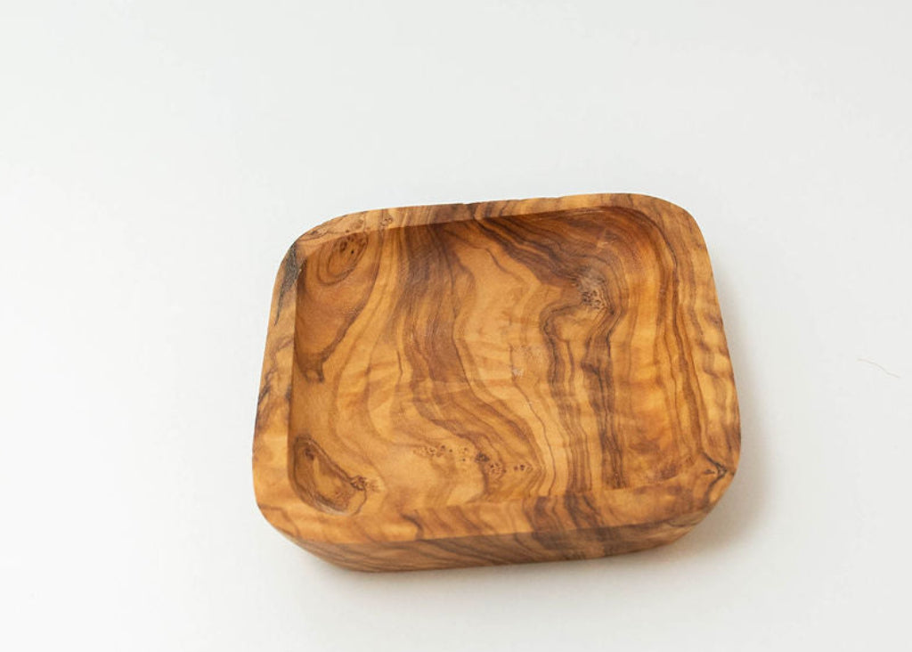 Handcrafted square olive wood dipping dish with natural wood grain