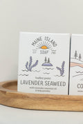 Maine Island Soap Lavender Seaweed bar displayed with other scents on a wooden tray