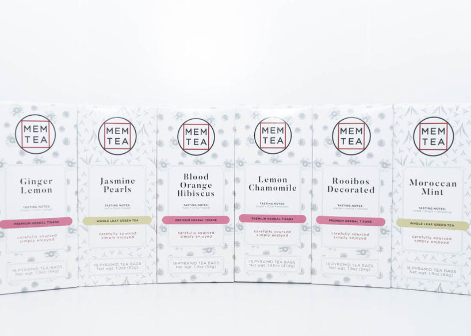 Six MEM Tea varieties including Ginger Lemon, Jasmine Pearls, Blood Orange Hibiscus, Lemon Chamomile, Rooibos Decorated, and Moroccan Mint.