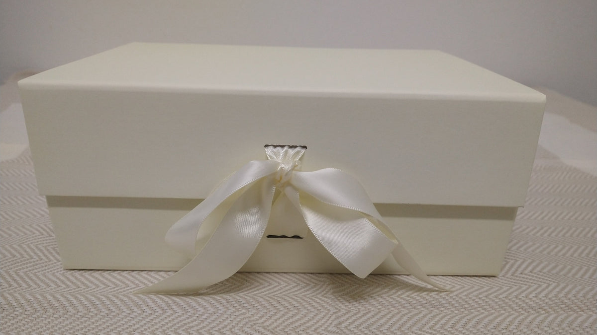 Ready-to-gift baby bath gift set in cream box with ribbon