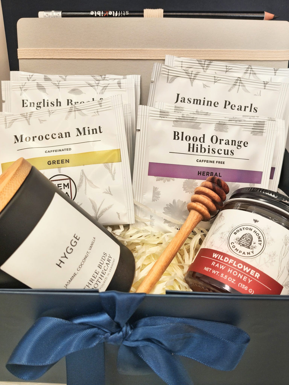 Hygge gift box with candle, Italian notebook, MEM tea, wildflower honey and olive wood honey dipper.