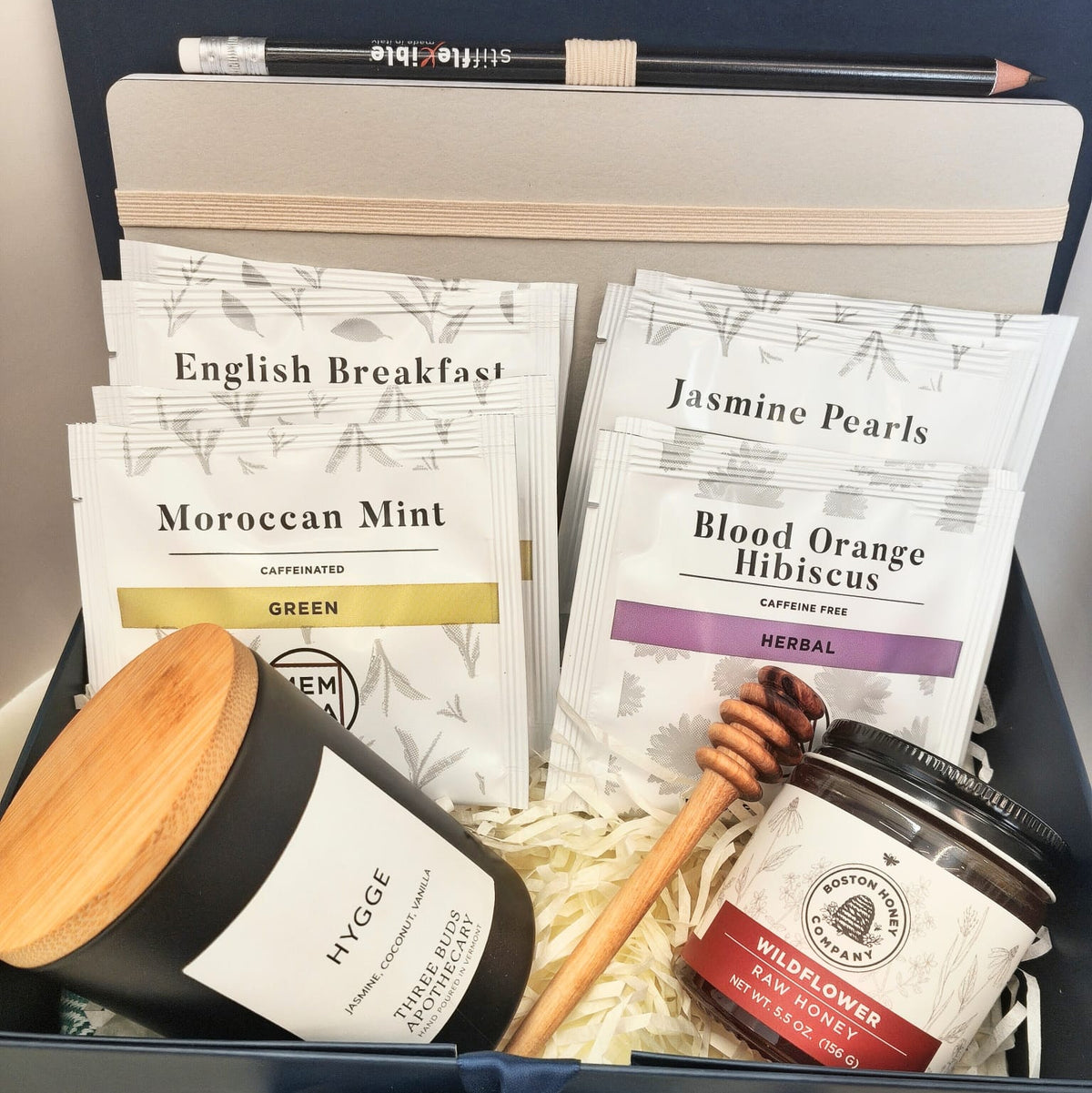 Hygge gift box with candle, Italian notebook, MEM tea, wildflower honey and olive wood honey dipper.