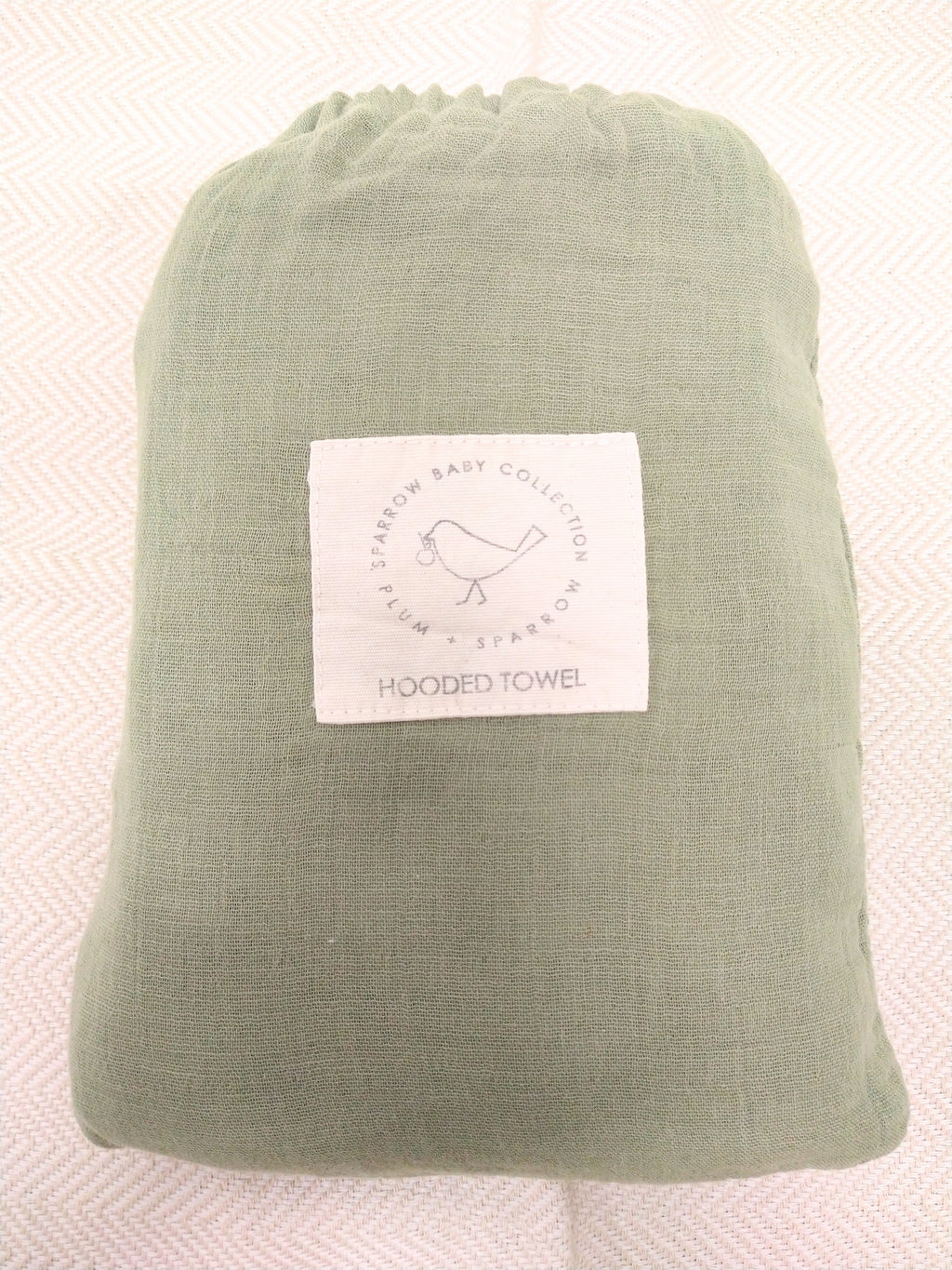 Plum and Sparrow olive muslin hooded bath towel