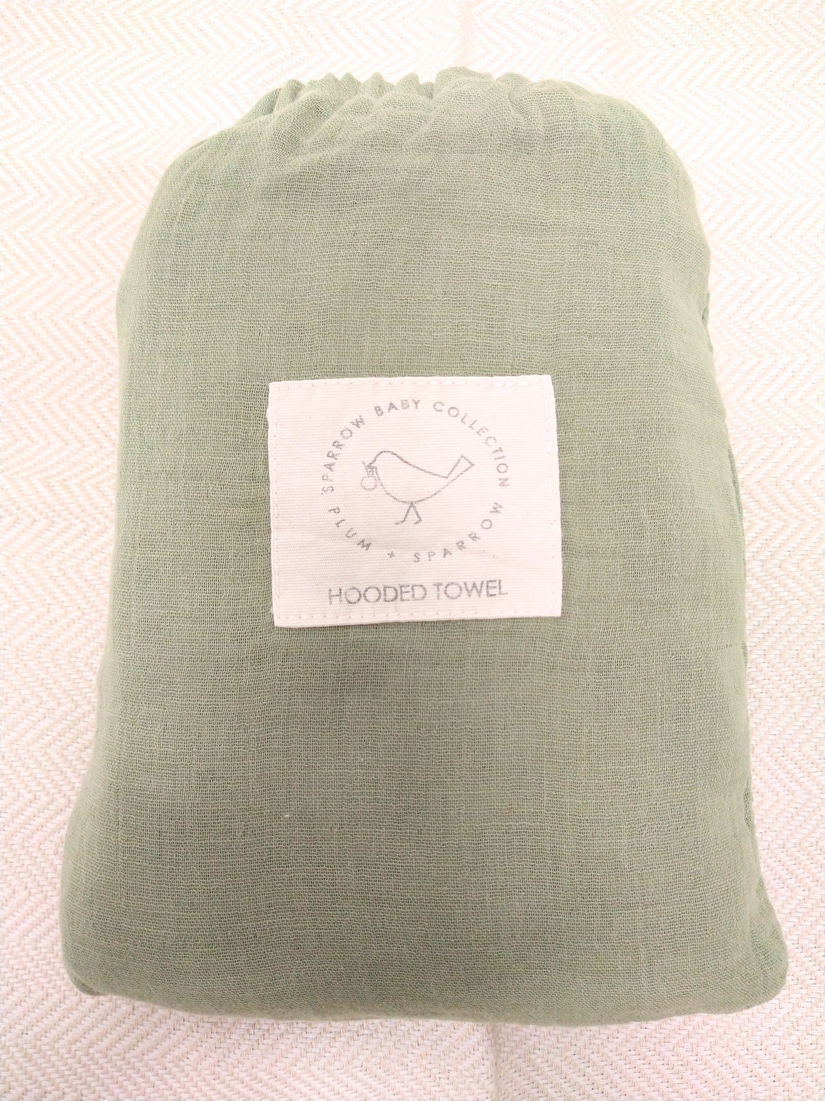 Plum and Sparrow olive muslin hooded bath towel