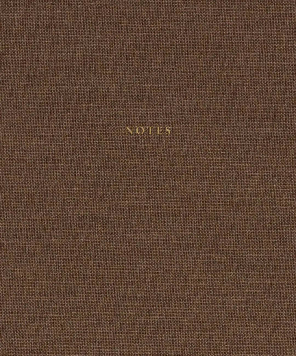 Dark brown linen hardcover notebook with gold foil lettering by Cozy Publishing.