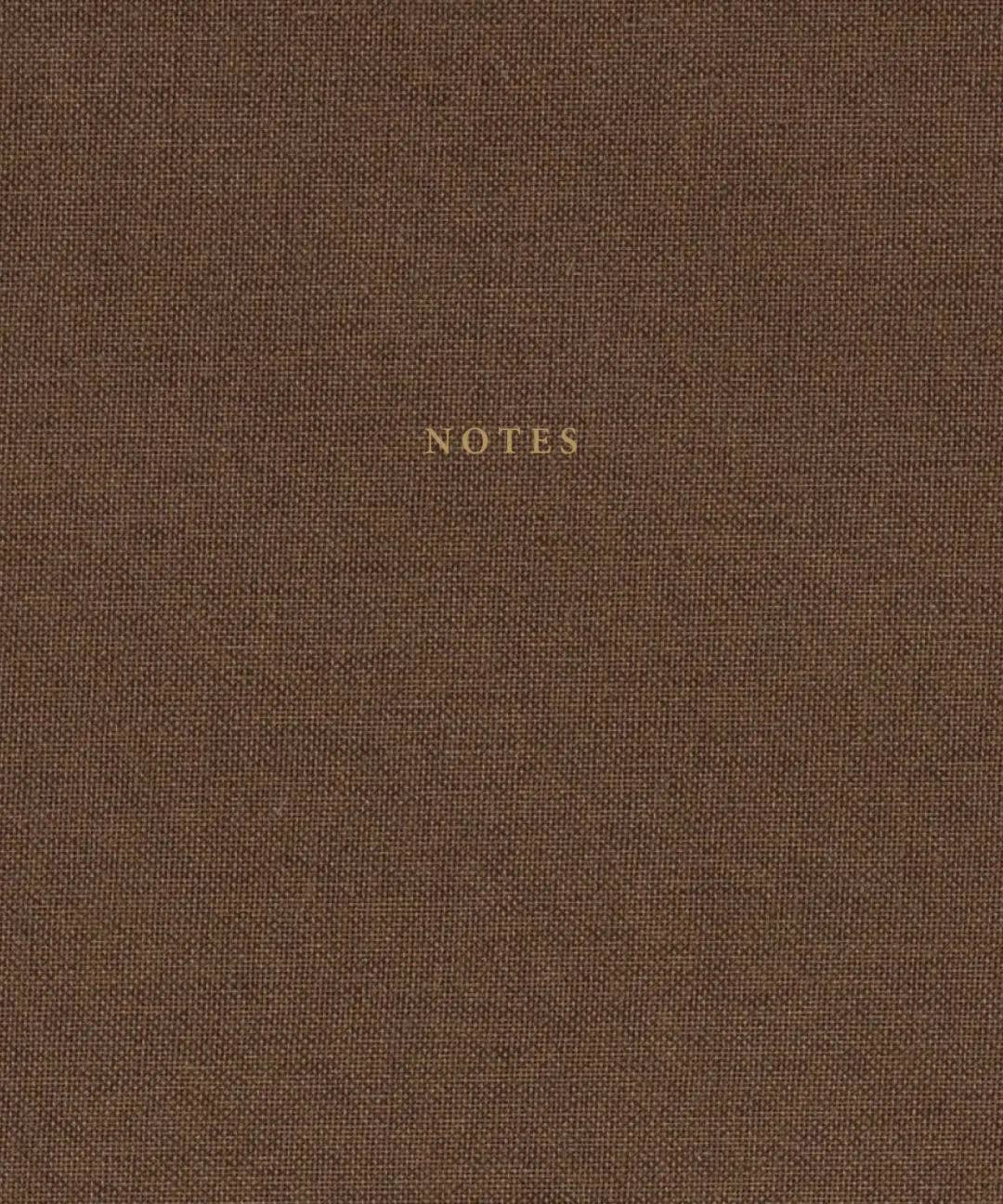 Dark brown linen hardcover notebook with gold foil lettering by Cozy Publishing.