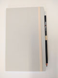 Dove Gray Stifflexible notebook made in Italy with attached pencil.
