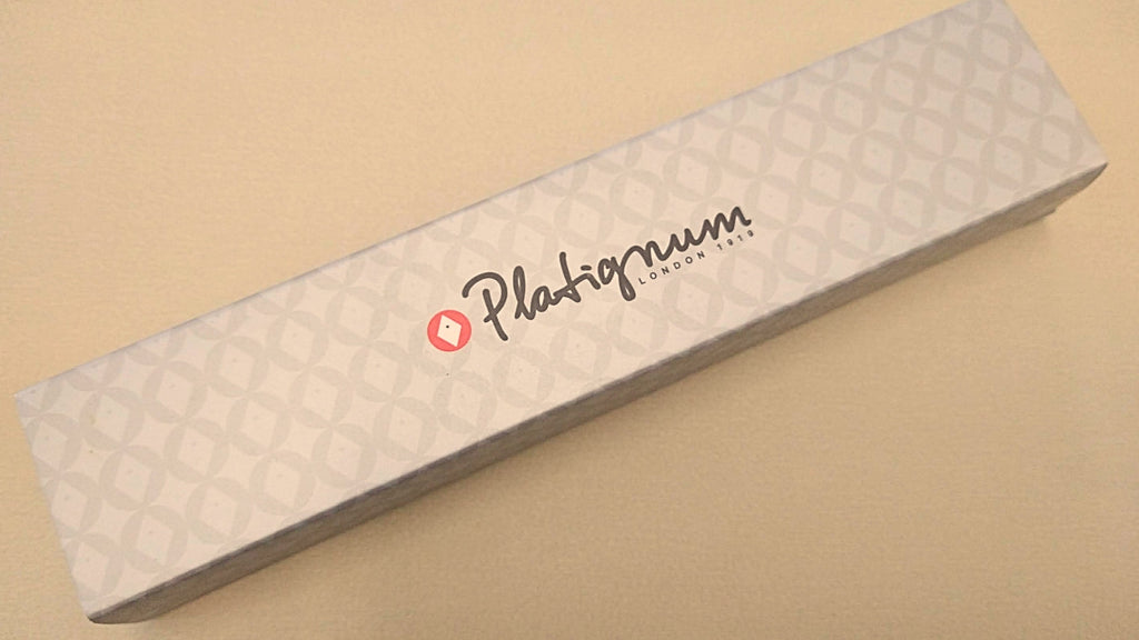 Platignum No. 9 ballpoint pen presented in its patterned sliding gift box.