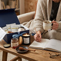 Hygge gift box with candle, Italian notebook, MEM tea, wildflower honey and olive wood honey dipper